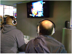 Tradeshow Visitors Wearing Headphones with Covers